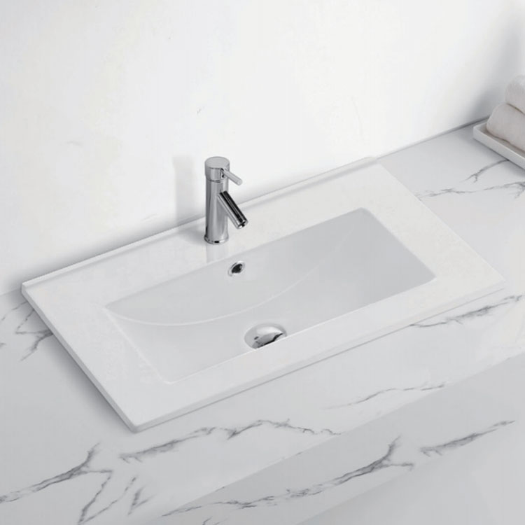 Hvordan kan jeg reparere og vedligeholde ridser på min keramiske håndvask?